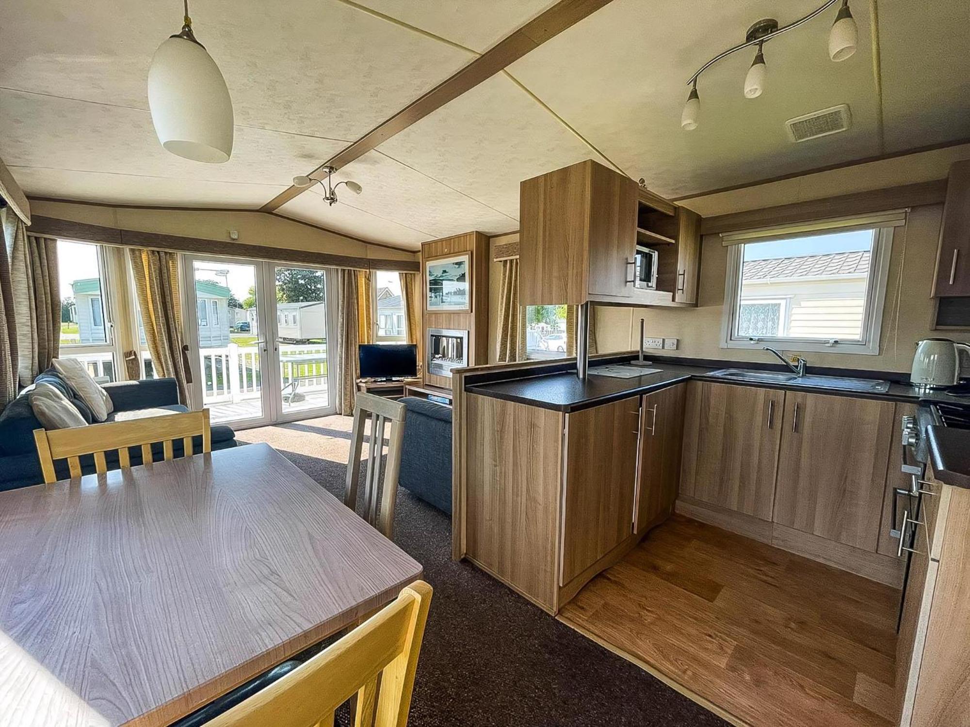 Lovely Caravan With Decking At Cherry Tree In Norfolk Ref 70528c Campsite *